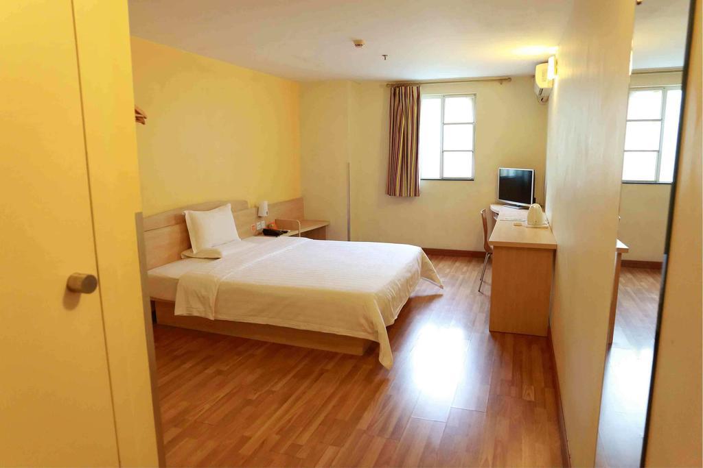7Days Inn Taizhou Nantong Road Zhongjia Habitación foto