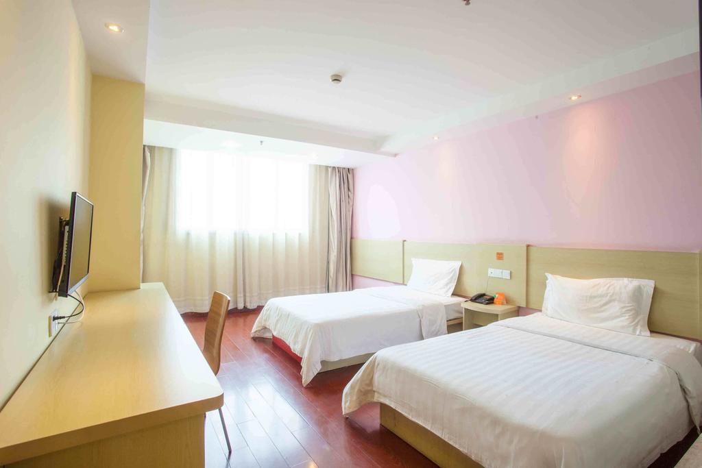 7Days Inn Taizhou Nantong Road Zhongjia Habitación foto